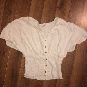 cream/white short sleeve shirt
